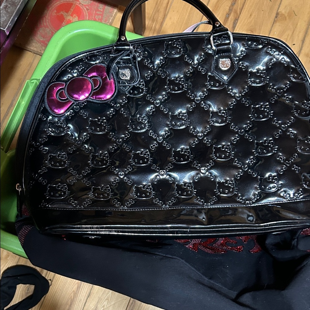 Hello Kitty Glossy Black Travel Bag with Pink Bow
